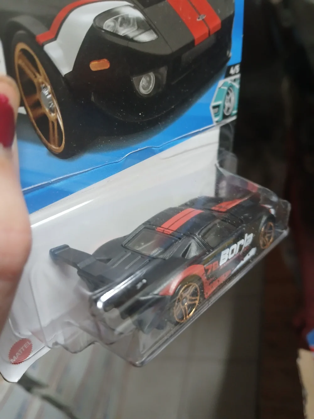 the Hot Wheels Ford GT (159/250) in black with red and white accents
